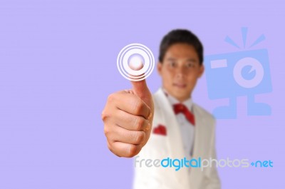 Business Man Pressing The Button Stock Photo