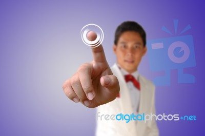 Business Man Pressing The Button Stock Photo