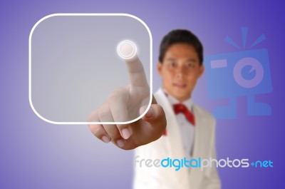 Business Man Pressing The Button Stock Photo