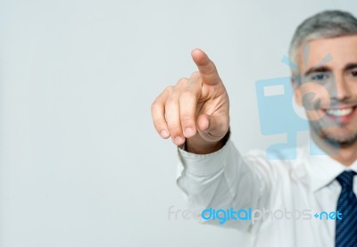 Business Man Pushing On A Touch Screen Stock Photo