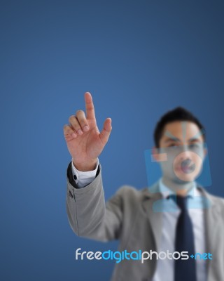 Business Man Pushing On A Touch Screen Interface Stock Photo