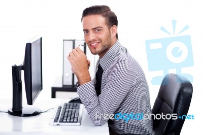 Business Man Smiling At You In The Office Stock Photo