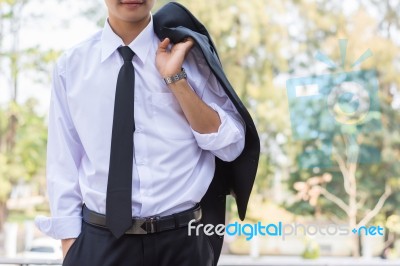 Business Man Standing On The Balcony Stock Photo