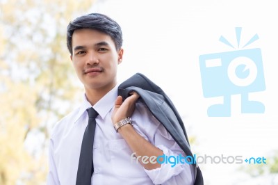 Business Man Standing On The Balcony Stock Photo