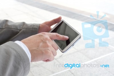 Business Man Using A Mobile Phone Stock Photo