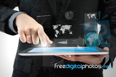 Business Man Using A Touch Screen Device Stock Photo