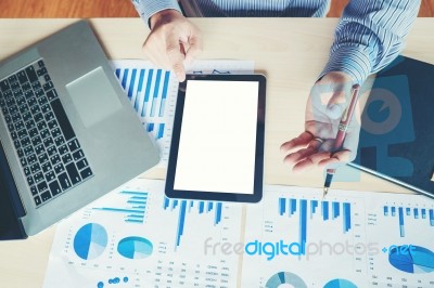 Business Man Using Tablet Blank Screen With  Report Chart Stock Photo