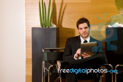 Business Man Waiting In Lobby Stock Photo