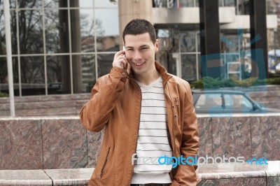 Business Man With A Smart Phone Stock Photo