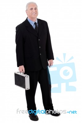 Business Man With Briefcase Stock Photo