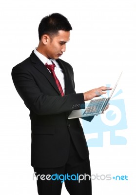 Business Man With Laptop Isolated Stock Photo