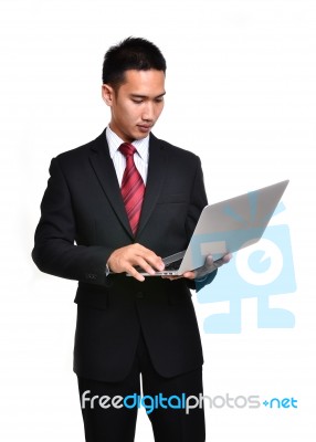 Business Man With Laptop Isolated Stock Photo