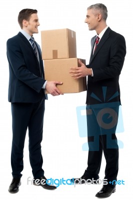 Business Men Posing With Cardboard Boxes Stock Photo