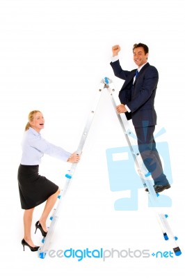 Business People Climbing On Ladder Stock Photo