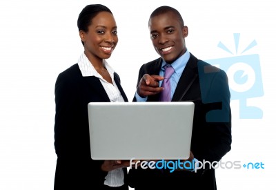 Business People Holding Laptop Stock Photo