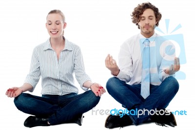 Business People Practicing Meditation Stock Photo