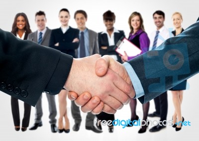 Business People Shaking Hands Stock Photo