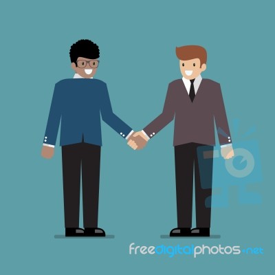 Business People Shaking Hands During A Meeting Stock Image