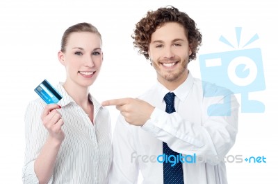 Business People Showing Credit Card Stock Photo