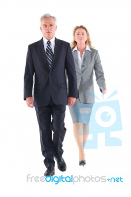 Business People Walking Stock Photo