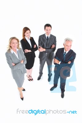 Business People With Arms Folded Stock Photo