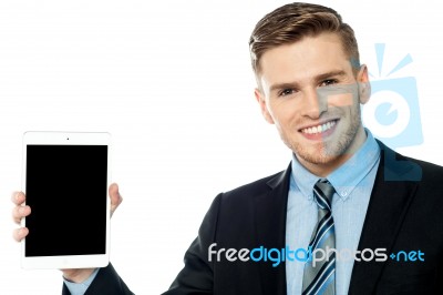 Business Person Showcasing Tablet Device Stock Photo