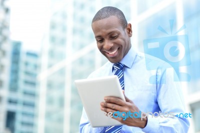 Business Professional Using A Tablet Pc Stock Photo