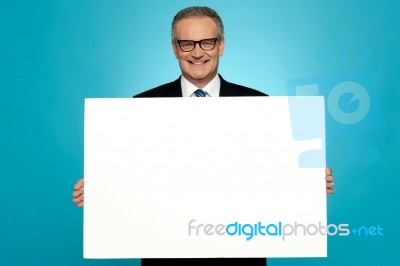 Business Representative Holding Blank Ad Board Stock Photo