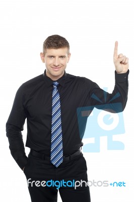 Business Representative Indicating Upwards Stock Photo