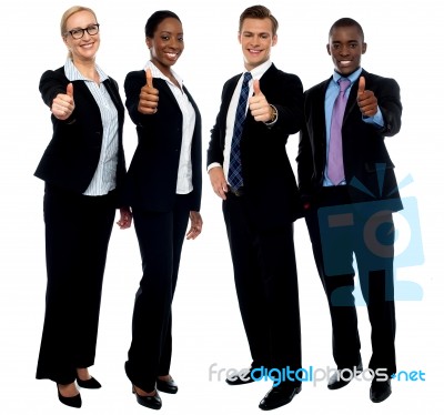 Business Team Showing Thumbs Up Stock Photo