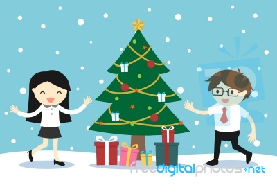 Business Woman And Businessman Feeling Happy With A Christmas Tree And Gift Boxes Stock Image