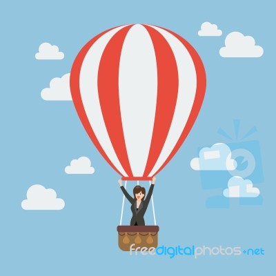 Business Woman Celebrating In Hot Air Balloon Stock Image