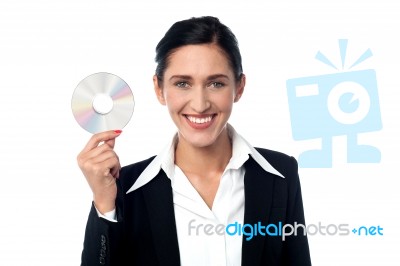 Business Woman Holding Compact Disc Stock Photo