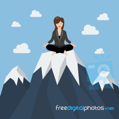 Business Woman Meditating On A Mountain Peak Stock Image