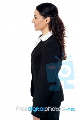 Business Woman Posing Sideways Stock Photo