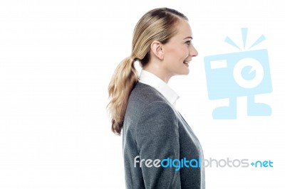 Business Woman Posing Sideways Stock Photo