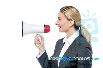 Business Woman Proclaiming Into Megaphone Stock Photo