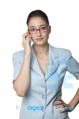 Business Woman Talking On A Smart Phone Stock Photo