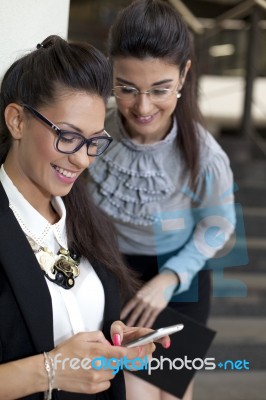 Business Women Chatting On A Break Stock Photo