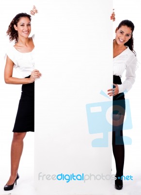 Business Women Standing With Board Stock Photo