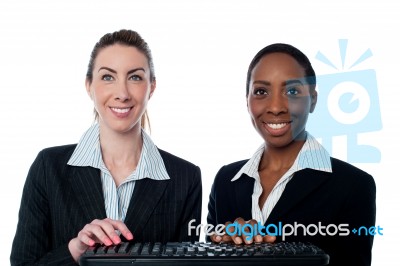 Business Women Typing On Keyboard Stock Photo