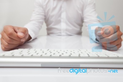 Businessman And Desktop Computer Stock Photo