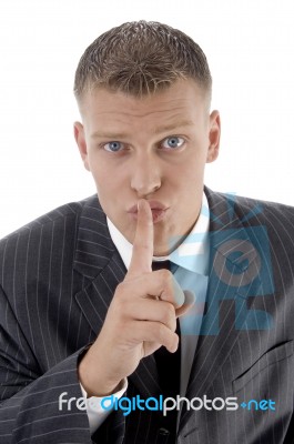 Businessman Asking To Keep Silent Stock Photo