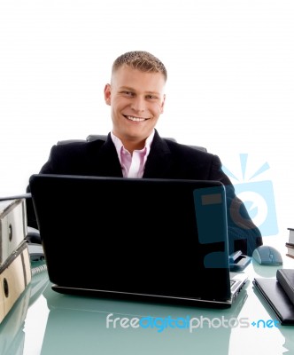 Businessman At Desk with laptop Stock Photo