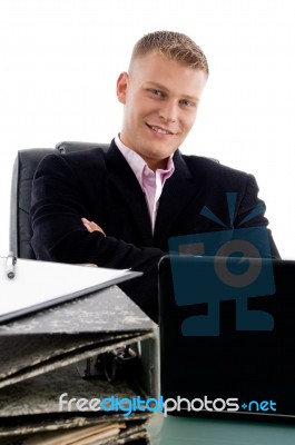 Businessman At Desk With Laptop Stock Photo