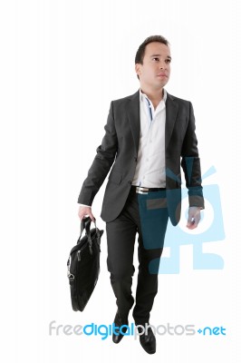 Businessman Carrying A Suitcase Stock Photo