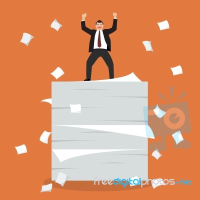 Businessman Celebrating On A Lot Of Documents Stock Image