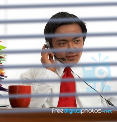 Businessman Communicating Online Stock Photo