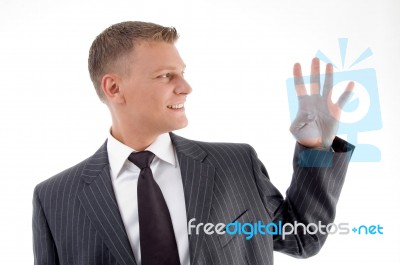 Businessman Counting Fingers Stock Photo