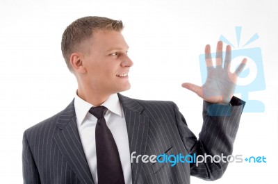 Businessman Counting Fingers Stock Photo